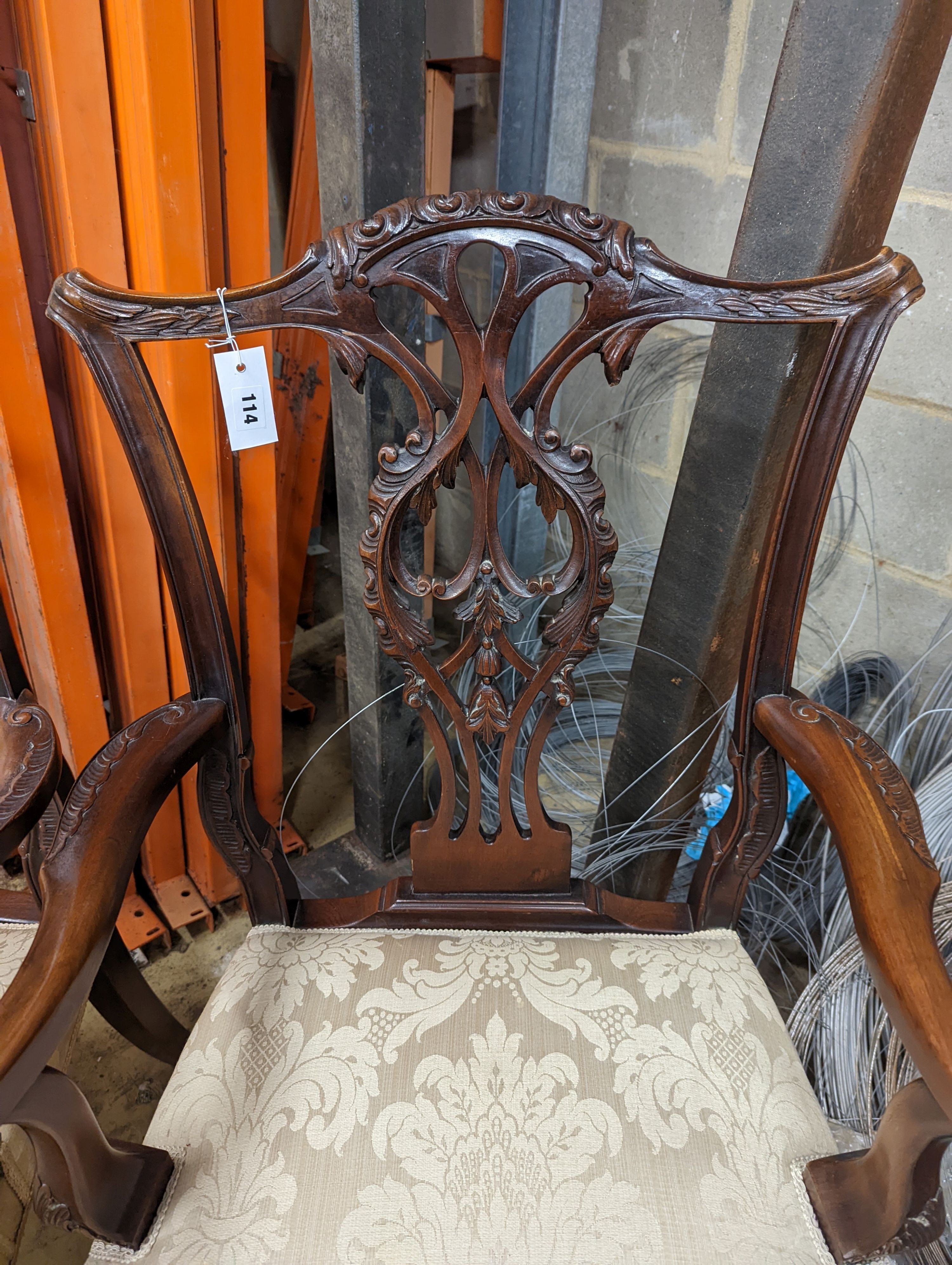 A pair of Chippendale revival mahogany elbow chairs, width 60cm, depth 50cm, height 102cm